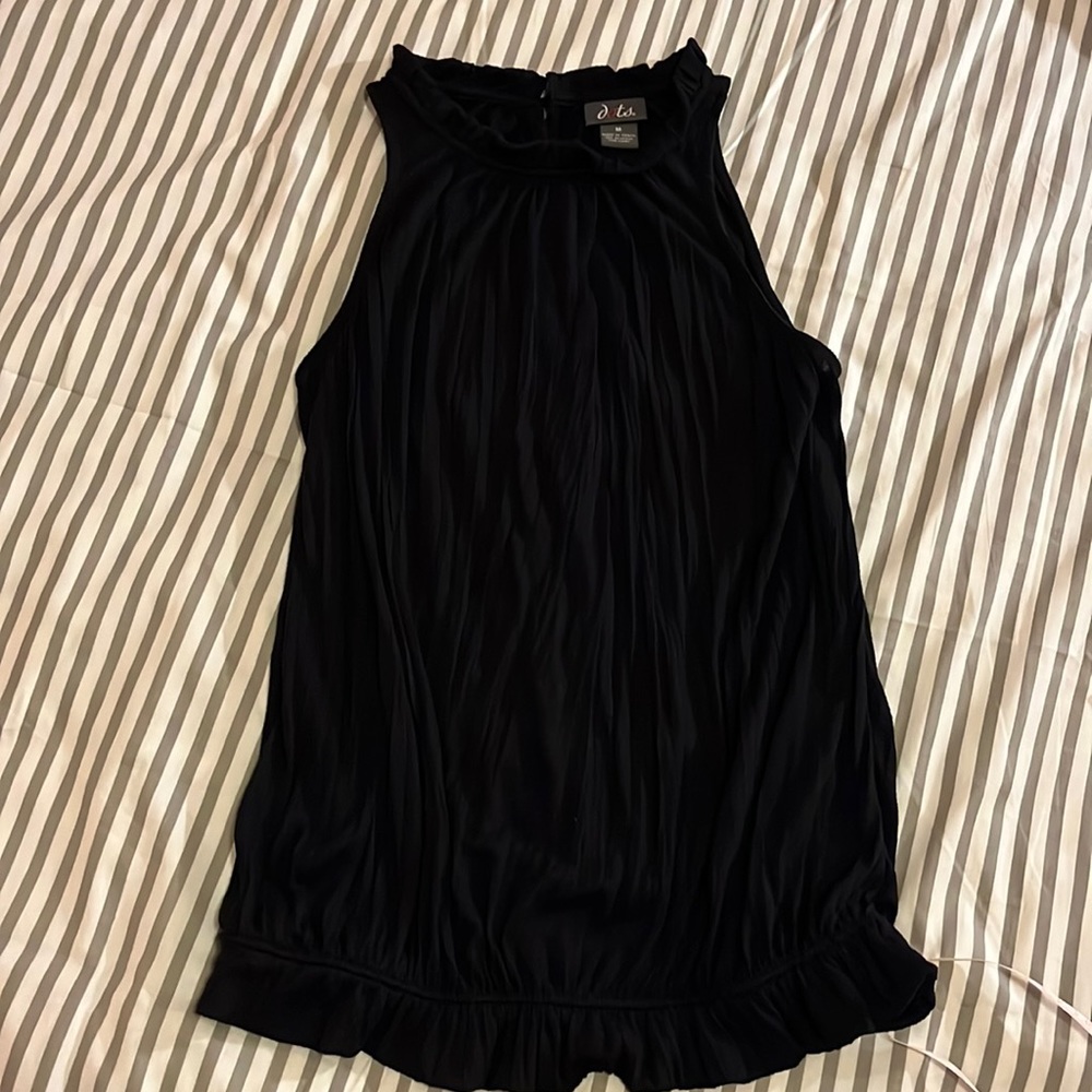 Black ruffle neck and bottom top size M.
